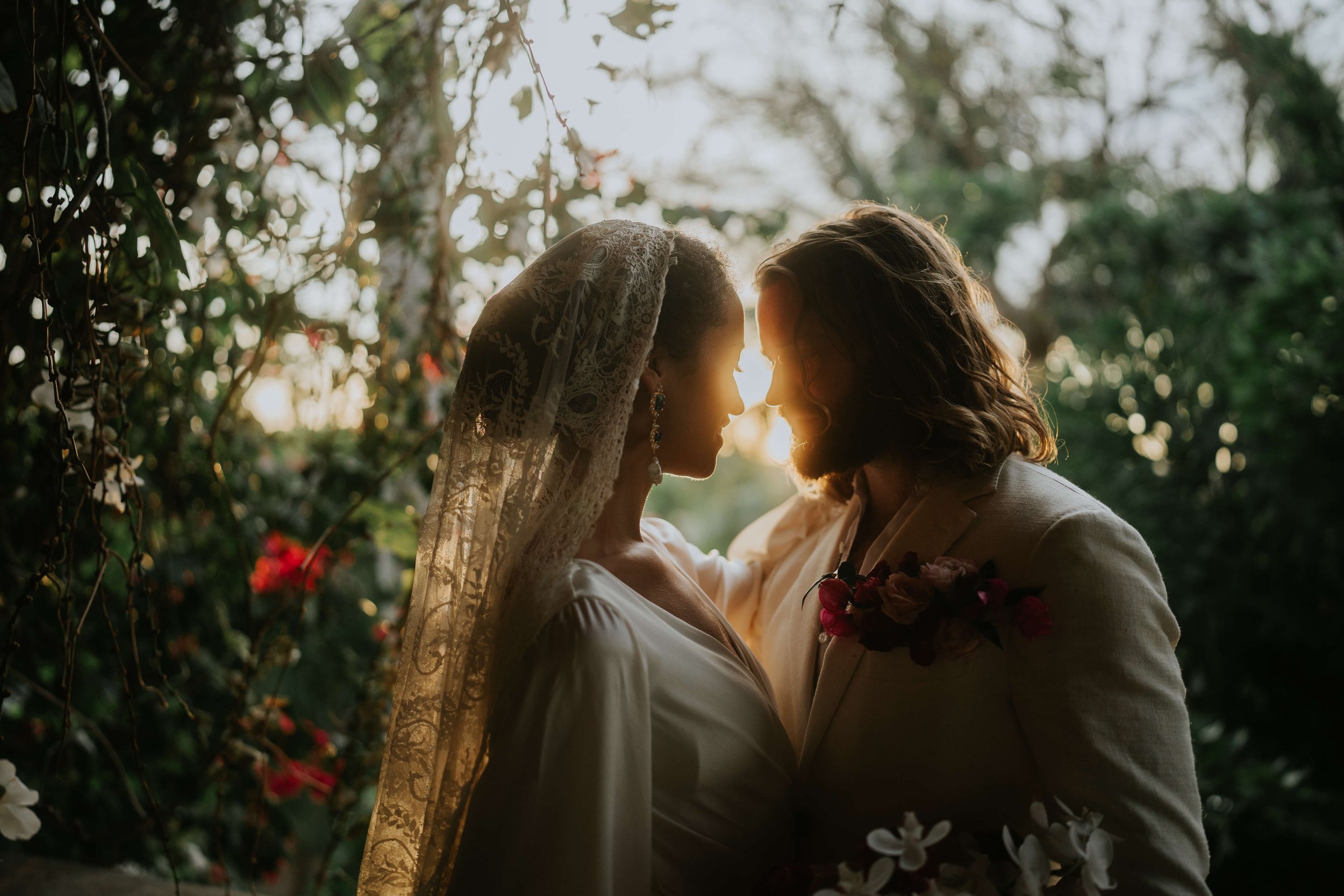 Romantic Wedding at Hacienda Siesta Alegre. Couple share intimate moment, the sunset silhouettes them